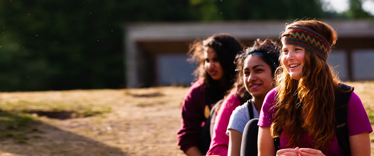 A group of teenage girls sitting together.