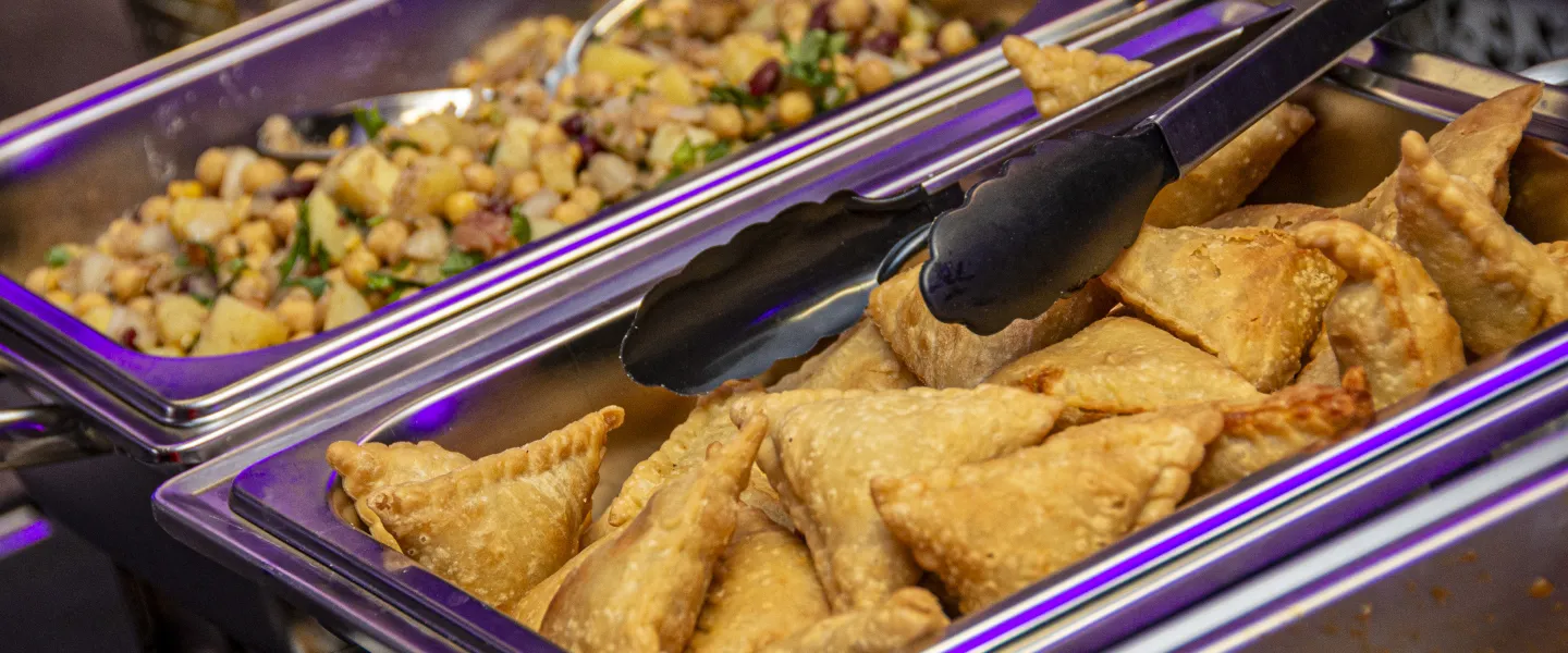 Samosas in serving dishes