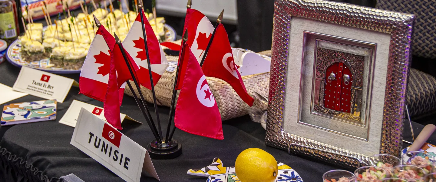 Close up of a table with Tunisian food and cultural items