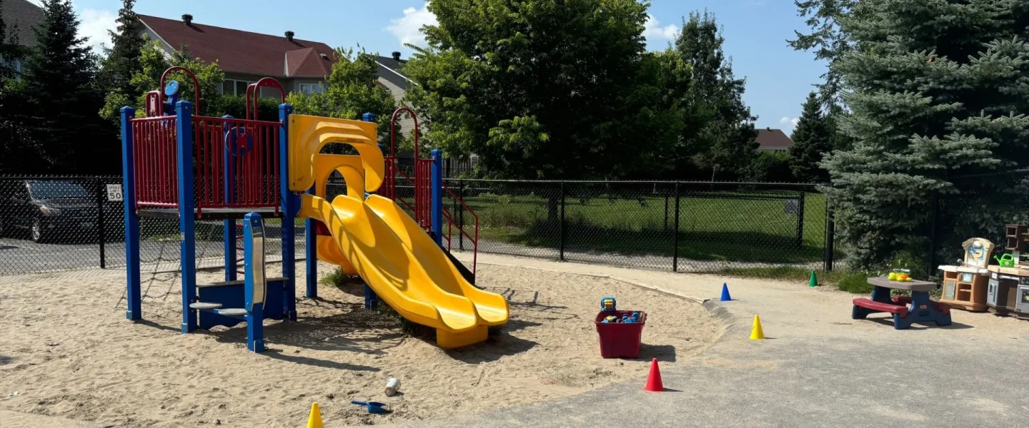 Avalon child care outdoor play structure with yellow slides