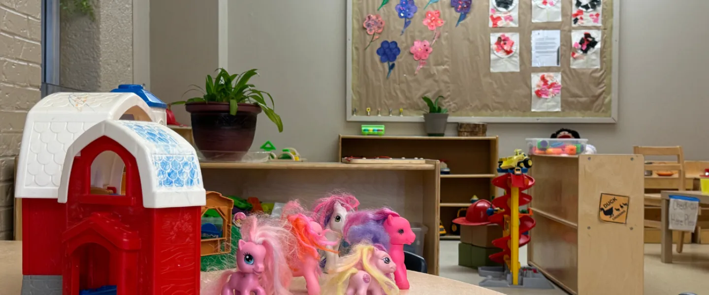 My Little Pony figures and a toy barn on a table at the Taggart Child Care Centre