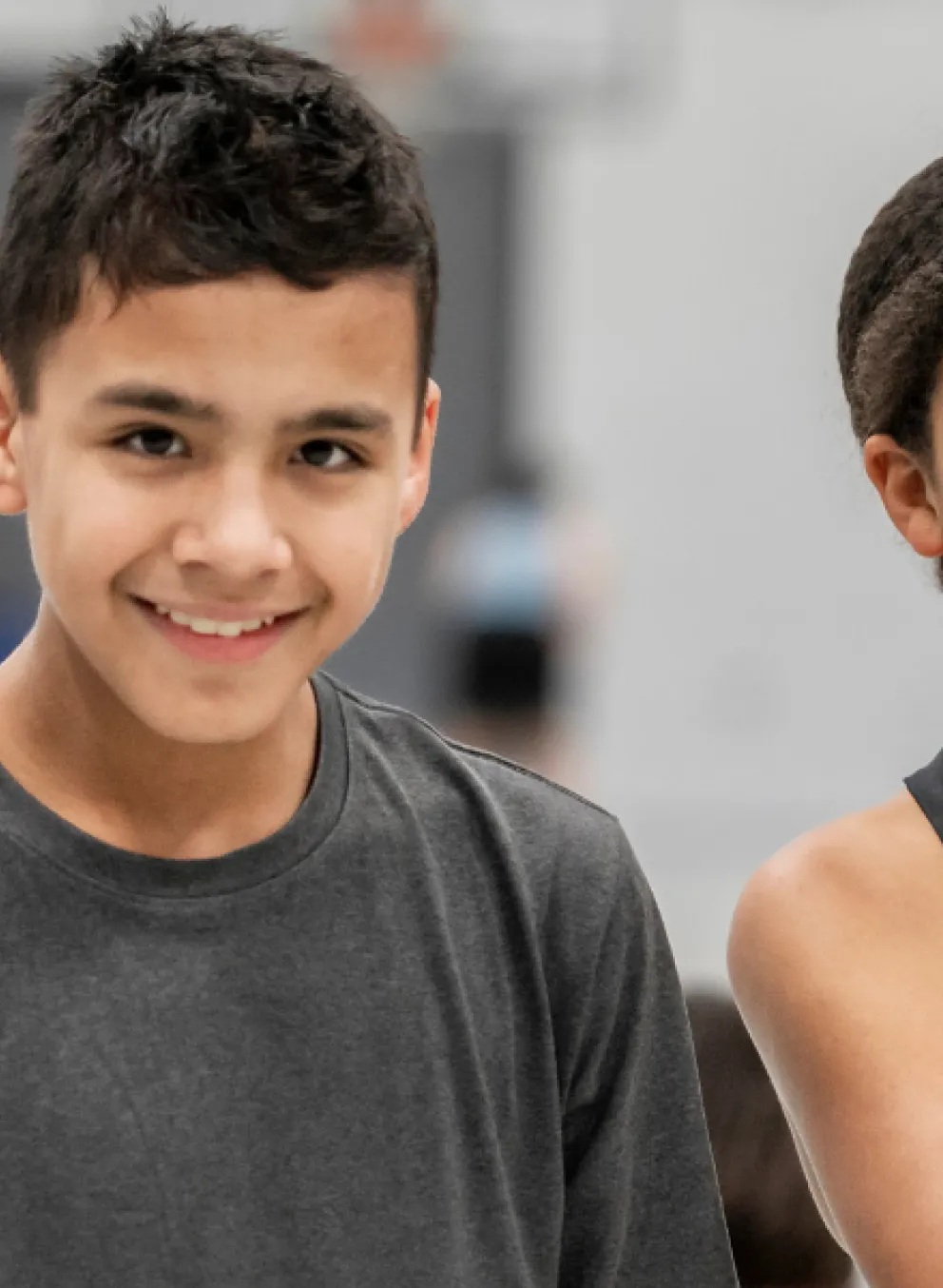 Boy and girl with basketball.