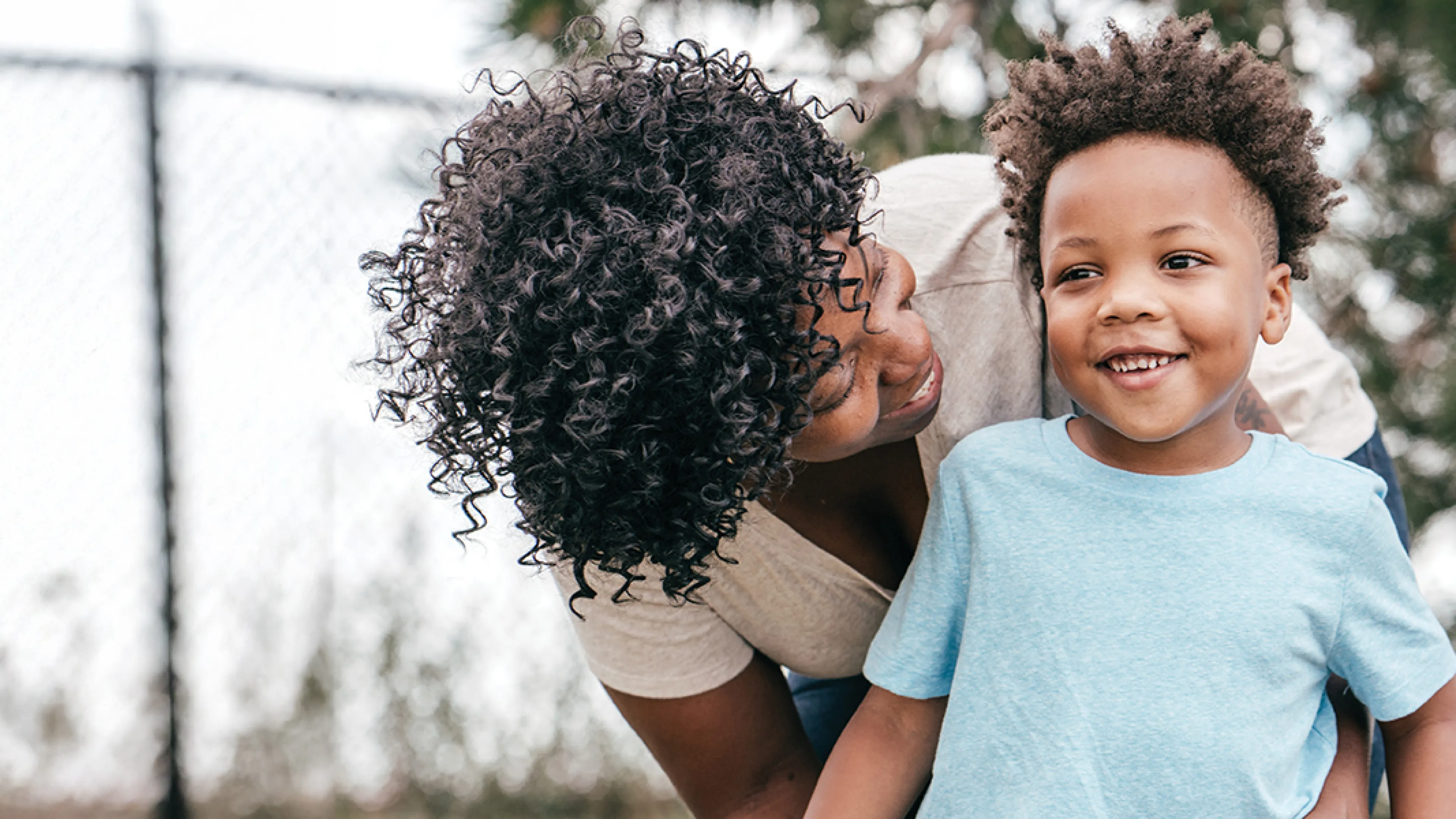 A mother and child playing.