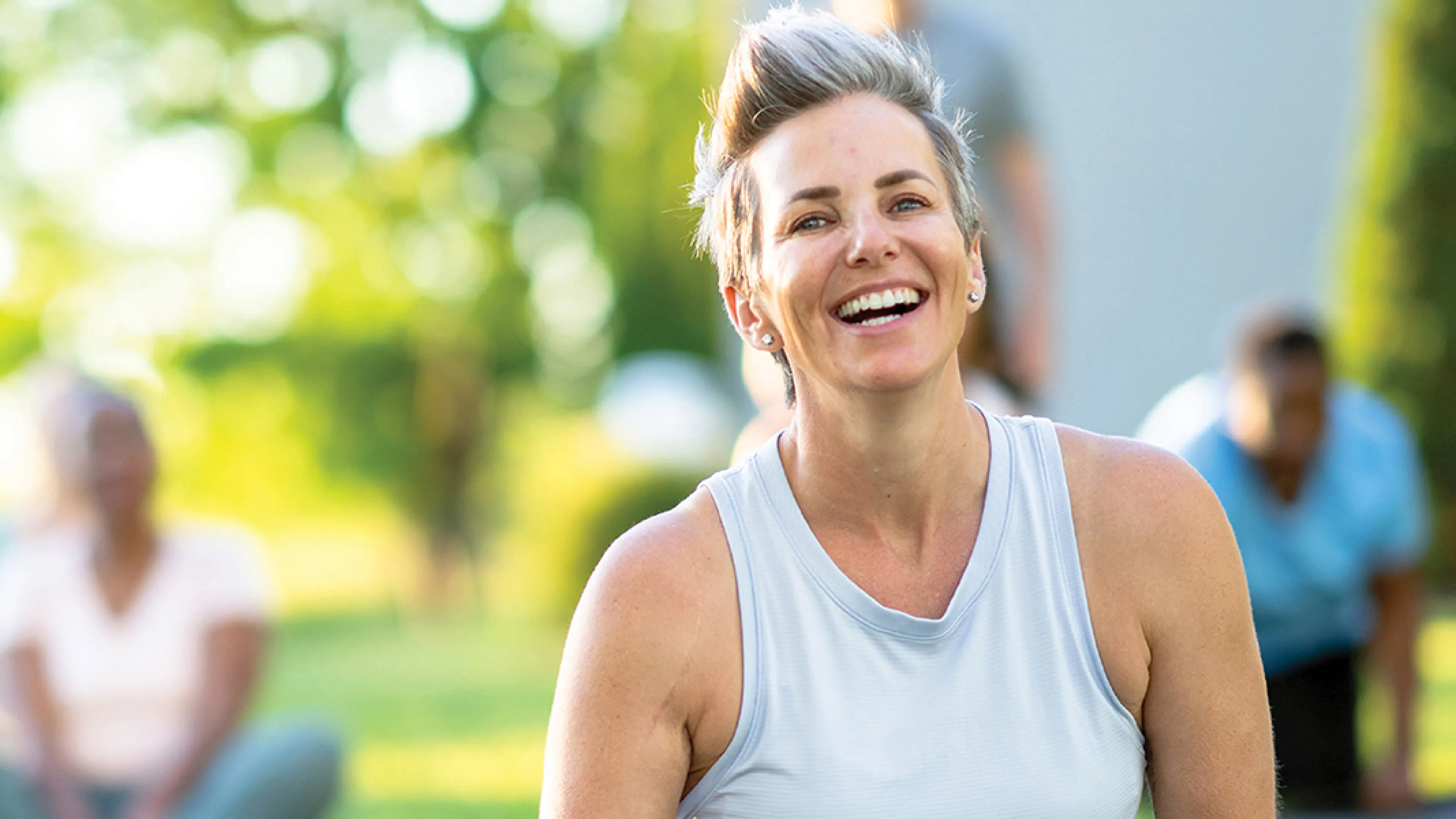 A women participates in an outdoor Yoga class.